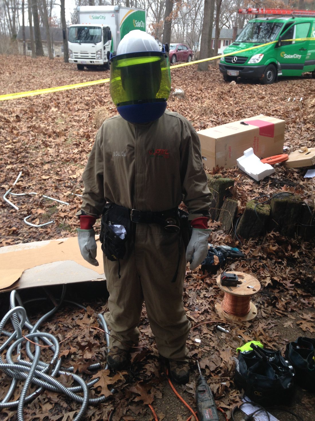 DaRoy Perkins in full arc-flash PPE with the shield down, February 2015